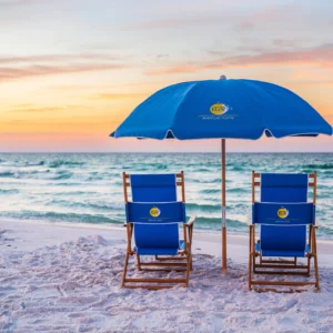 Two resort-style beach chairs and one umbrella